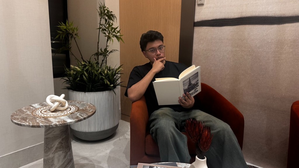 Antonio reading at home